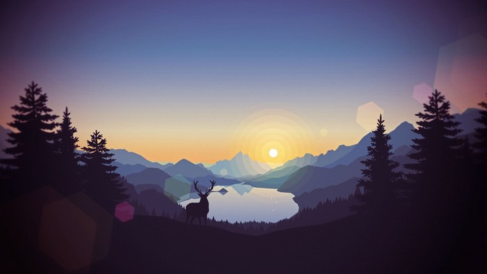 Deer in a mountain landscape at sunset