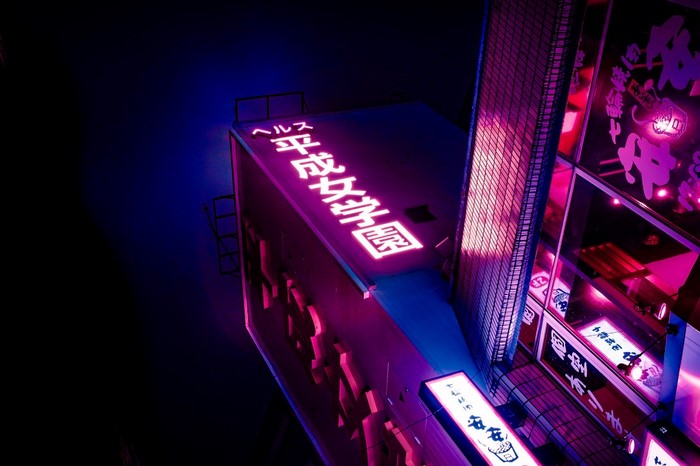 Neon signs in a Japanese city at night