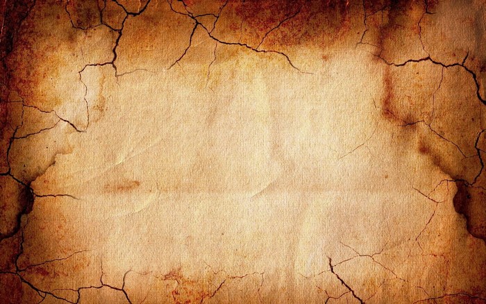Cracked old paper texture with brown stains