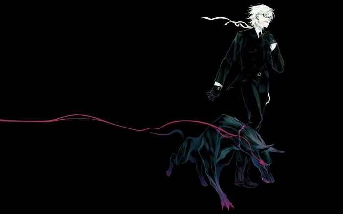 Man in suit with a dark dog