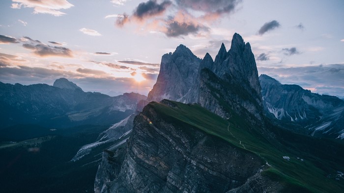 Sunrise over jagged mountain peaks in the Alps