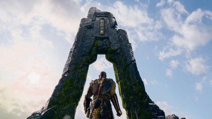 Kratos from God of War standing before a stone archway