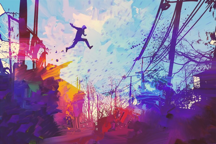 Man jumping between buildings in a colorful abstract city