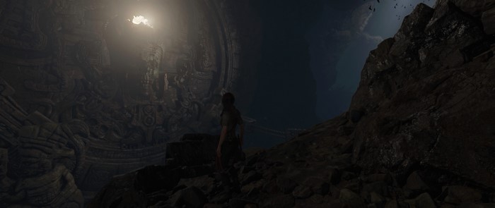 Lara Croft from Shadow of the Tomb Raider in a cave
