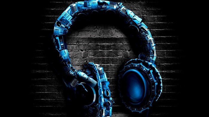 Blue mechanical headphones on a brick wall