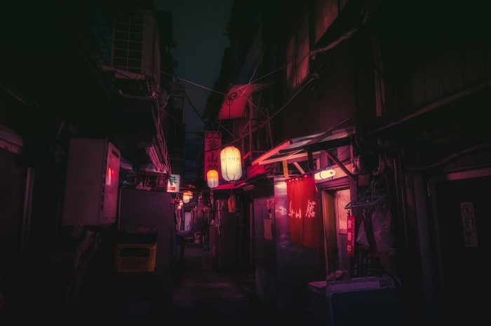 Dark alleyway with Japanese lanterns at night