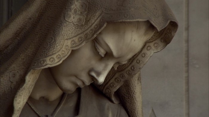 Marble sculpture of a woman wearing a veil
