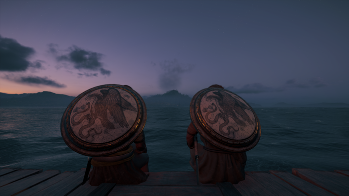 Two warriors with shields on a dock at dusk