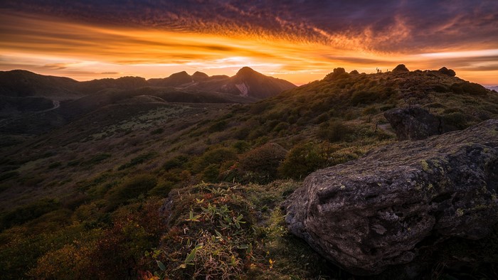 Mountain landscape at sunset with dramatic sky