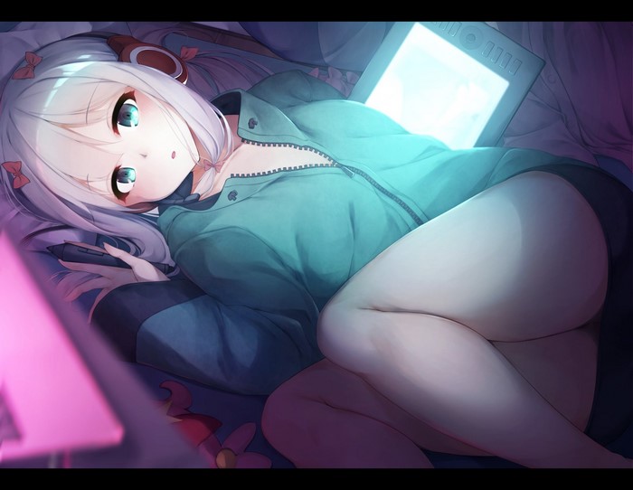 Anime girl with headphones and drawing tablet
