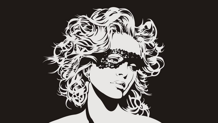 Woman with a decorative mask and curly hair