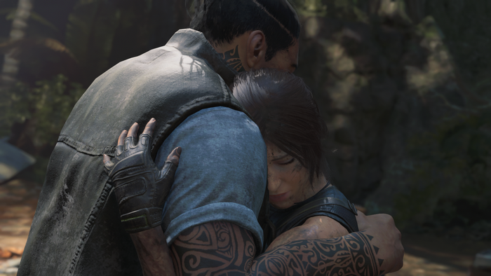 Lara Croft from Tomb Raider hugging a man