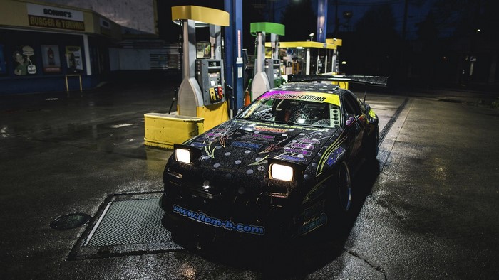 Mazda RX-7 FC at a gas station at night