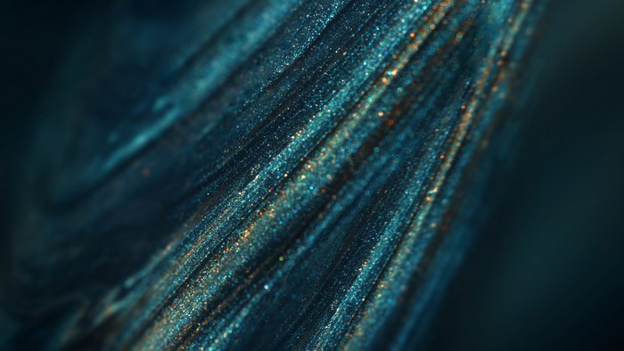 Teal and blue abstract glitter texture