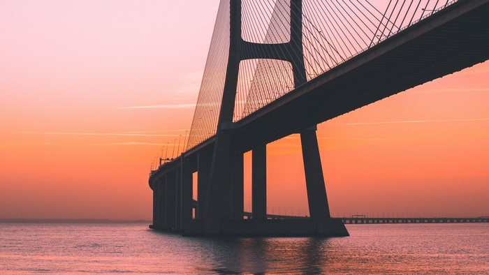 Vasco da Gama Bridge over the Tagus River at sunset