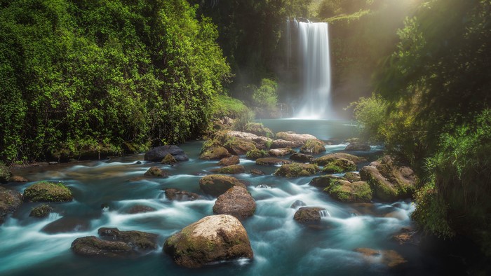 4K Waterfall and River with Stones in Nature