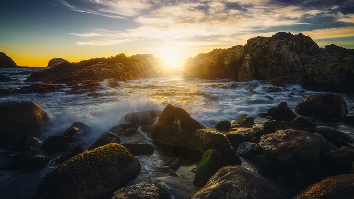 4K Sunset over Rocky Coastline with Waves