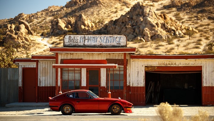 Red Nissan S30 Datsun at Bob's Hi-Way Service
