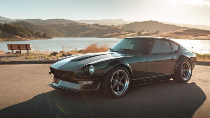 Modified Nissan S30 Z car parked by a lake