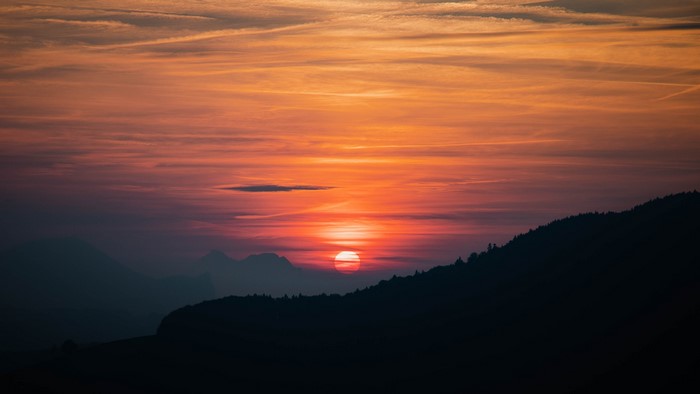 Sunset over mountains and hills