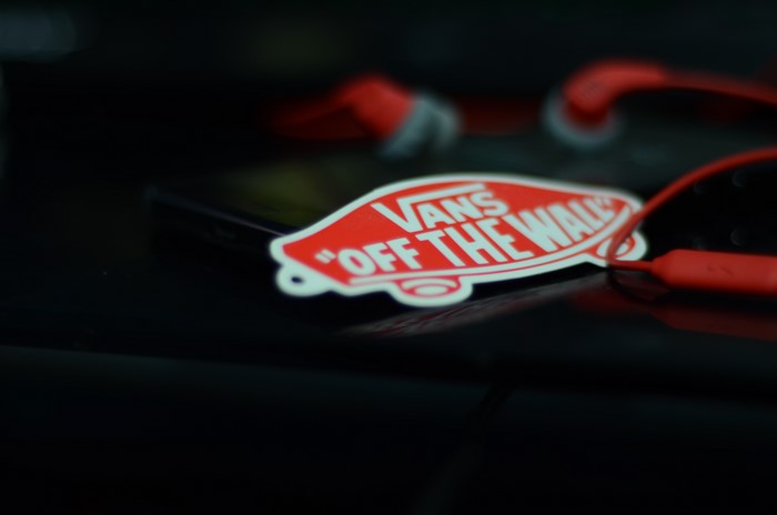 Vans Off The Wall sticker with red earphones