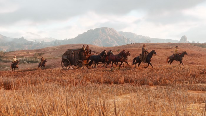 Red Dead Redemption 2 stagecoach in a field