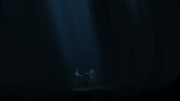 Two figures in a dark cave with light beams
