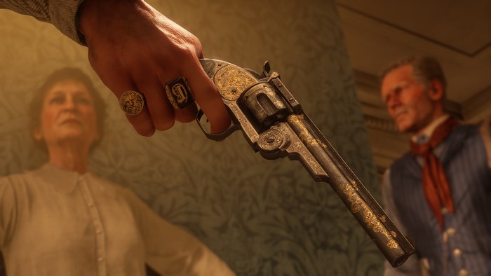 Red Dead Redemption 2: Hand holding ornate revolver