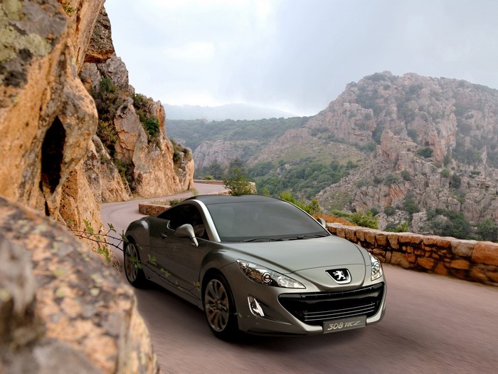 Peugeot RCZ driving on a mountain road