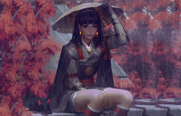 Woman in traditional Japanese attire in the rain