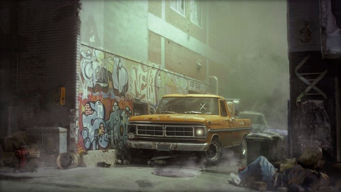 Abandoned urban alley with graffiti and a pickup truck