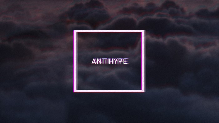 ANTIHYPE text in a neon square against clouds