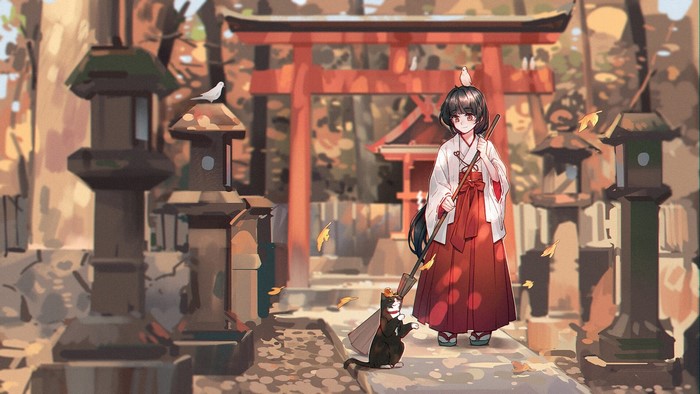 Miko and cat at a Japanese shrine in fall
