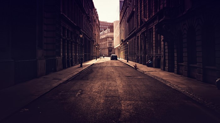 Sepia toned street photography of a city road
