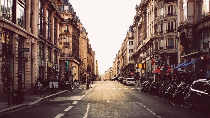 4K Paris street cityscape with buildings and parked motorcycles