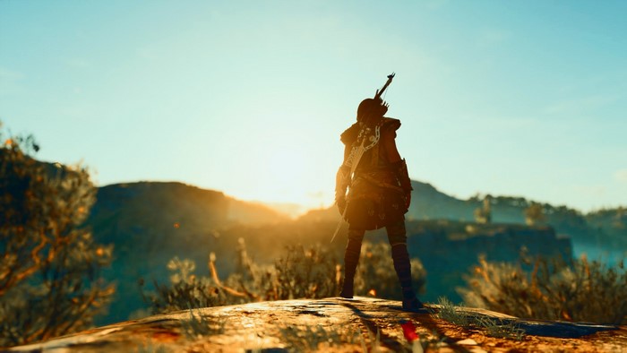 Kassandra from Assassin's Creed Odyssey on a hilltop