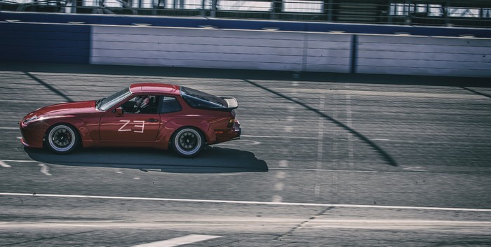 Red Porsche 944 on a race track