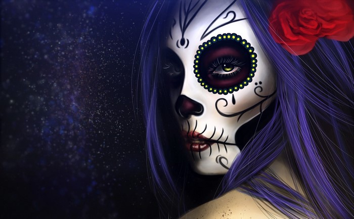 Woman with Dia de los Muertos makeup and red rose