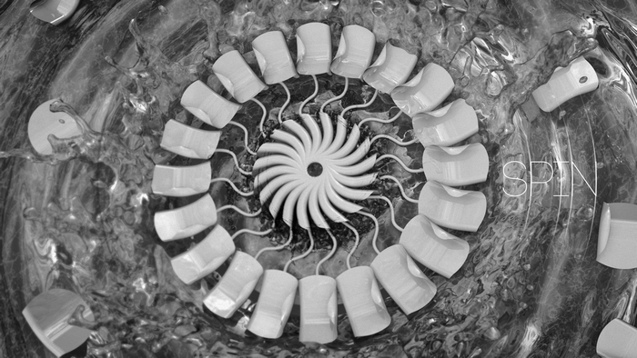 Monochrome abstract spin with liquid splashes