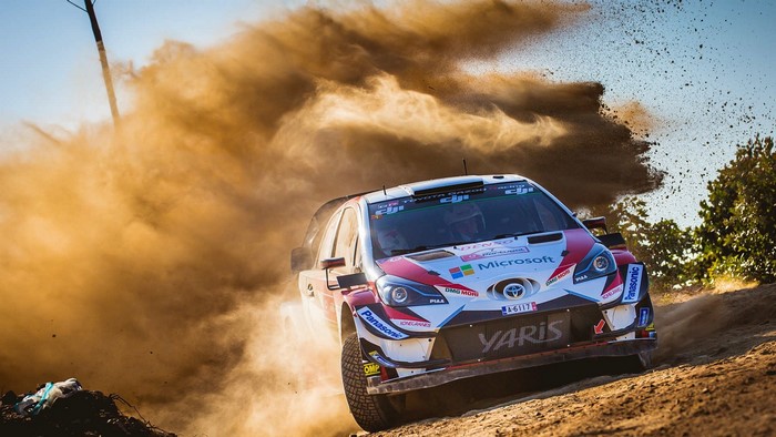 Jari-Matti Latvala's Toyota Yaris WRC car racing on dirt in Portugal