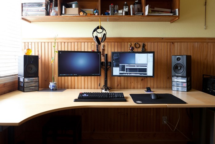 Dual monitors and computer setup with headphones
