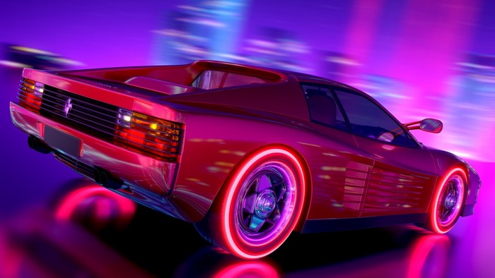 Red Ferrari Testarossa with neon wheels driving at night