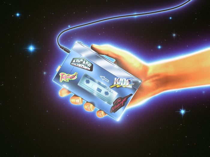 Hand holding a cassette player with stickers in space