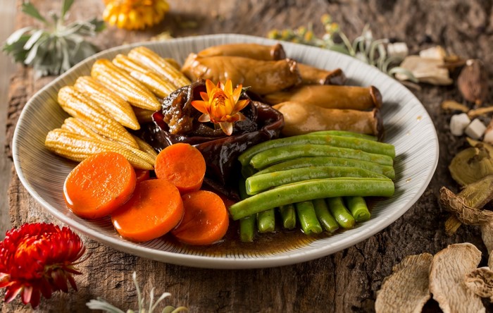 Plate of braised vegetables and mushrooms