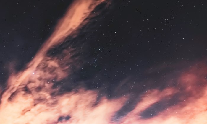 4K Night Sky with Pink Clouds and Stars