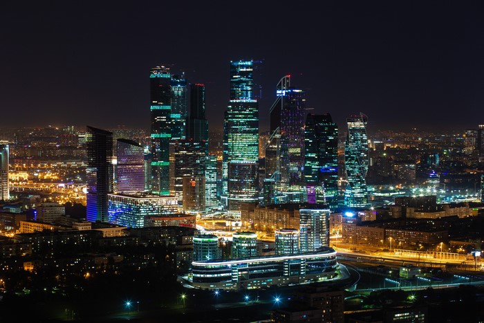 4K night cityscape with illuminated skyscrapers in Moscow, Russia