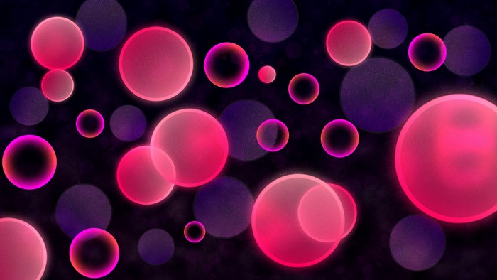 Abstract pink and purple glitter bokeh circles