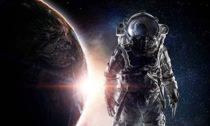 Astronaut in space with Earth in the background