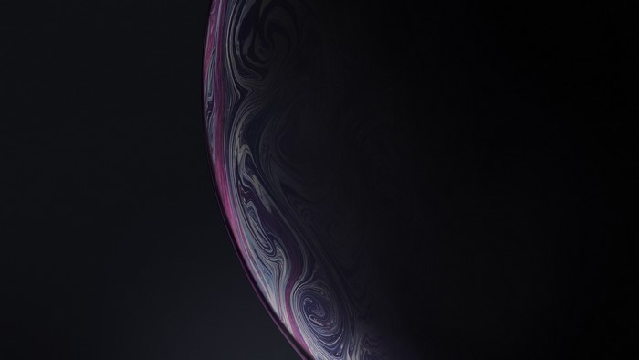 Abstract colorful swirls on dark background