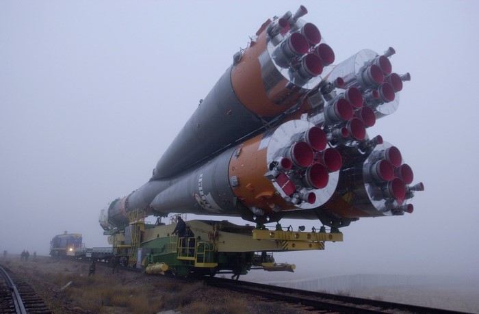 Soyuz rocket on a train in foggy weather